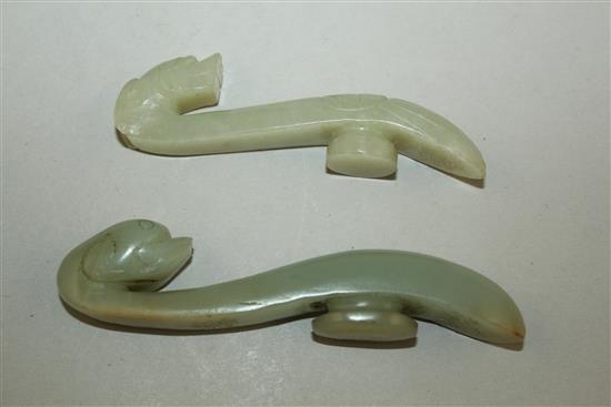 Two Chinese celadon jade belt hooks, 19th century, 11cm